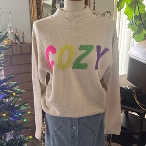 a new day Cream Sweater with Colorful Lettering